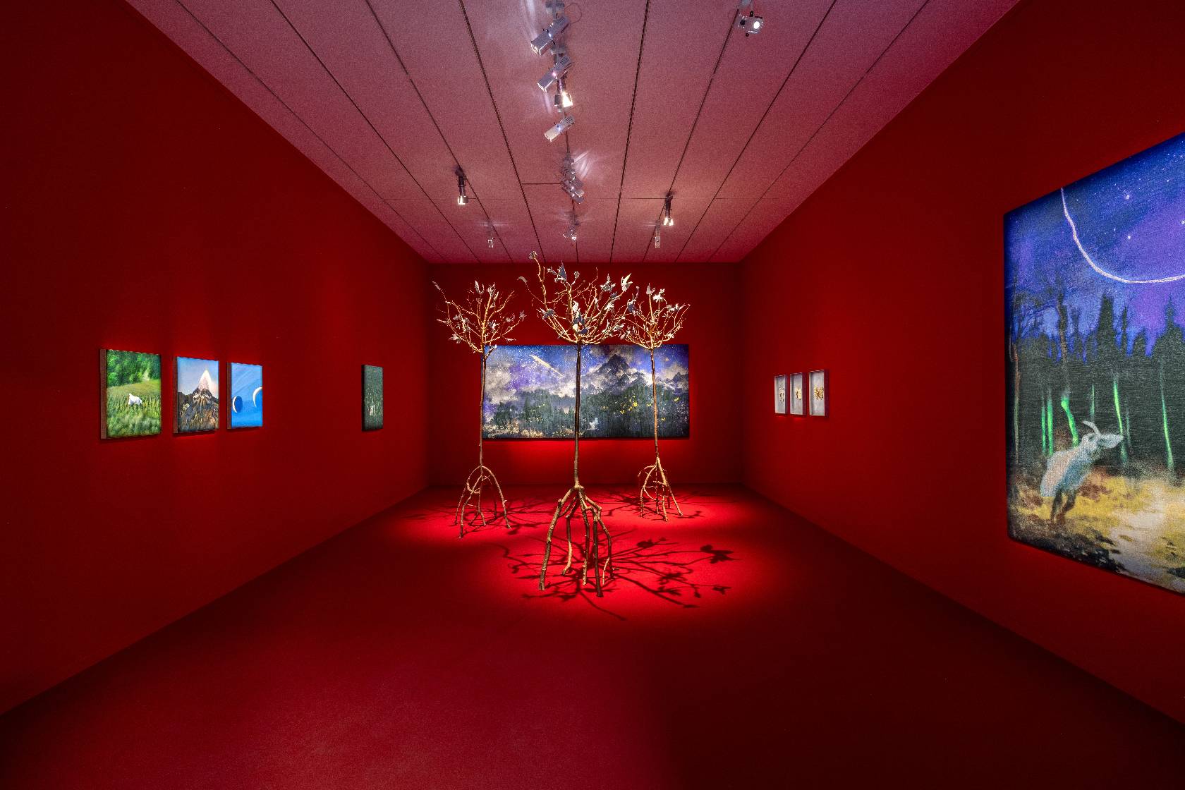 aurèce vettier, "la traversée de la forêt", installation at the Museum of Contemporarty Art of Lyon, 2025, Bronze sculptures, Aubusson tapestries, Oil paintings, all derived from AI-generated images - Photo Romain Darnaud